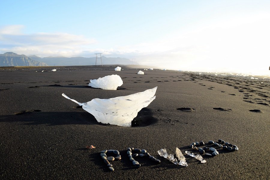 Ice from Jökulsárlón drifting ashore on a black sand beach